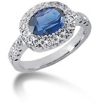 Blue Topaz Ring in Platinum with 28 diamonds (0.32ct)